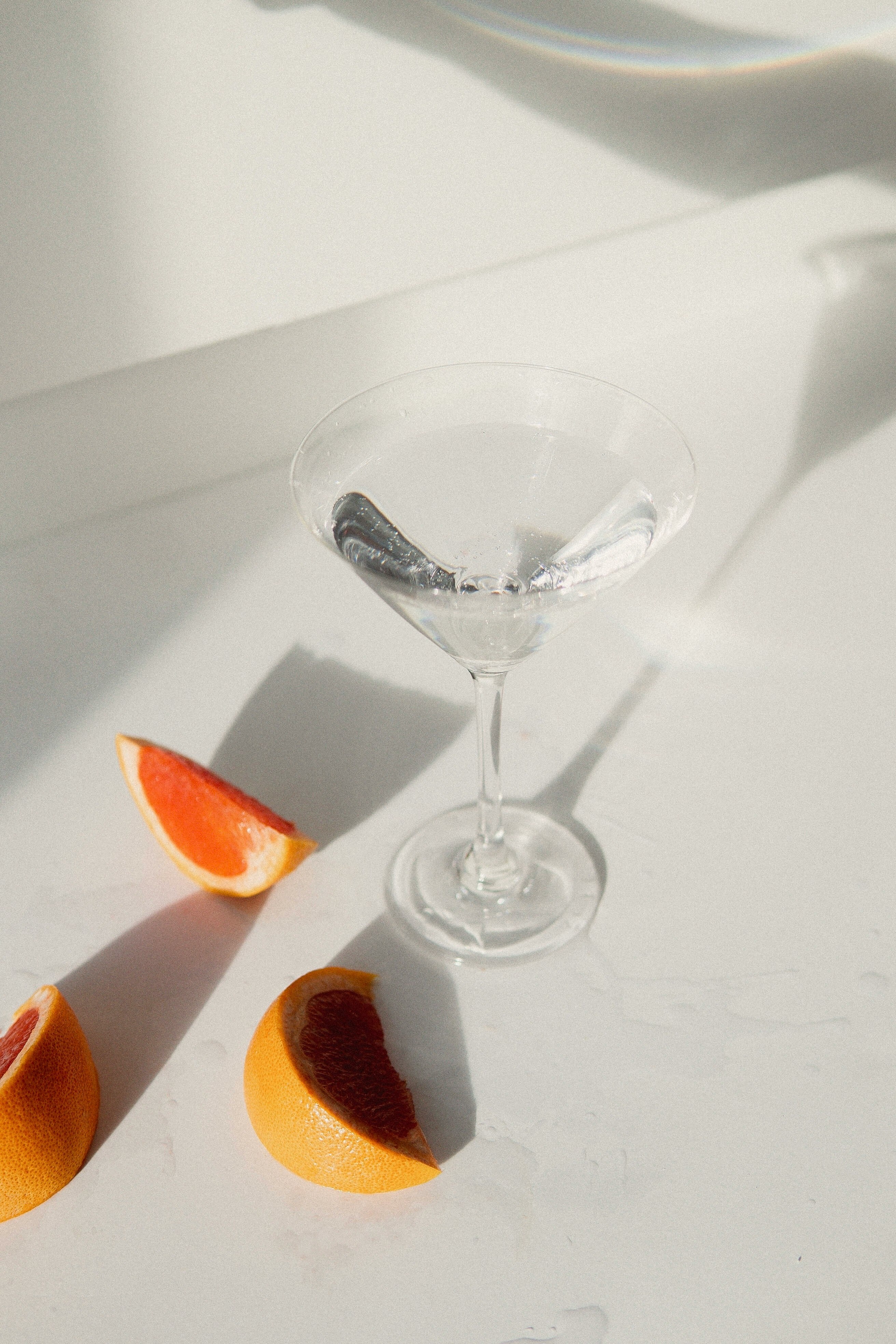 clear wine glass with sliced orange